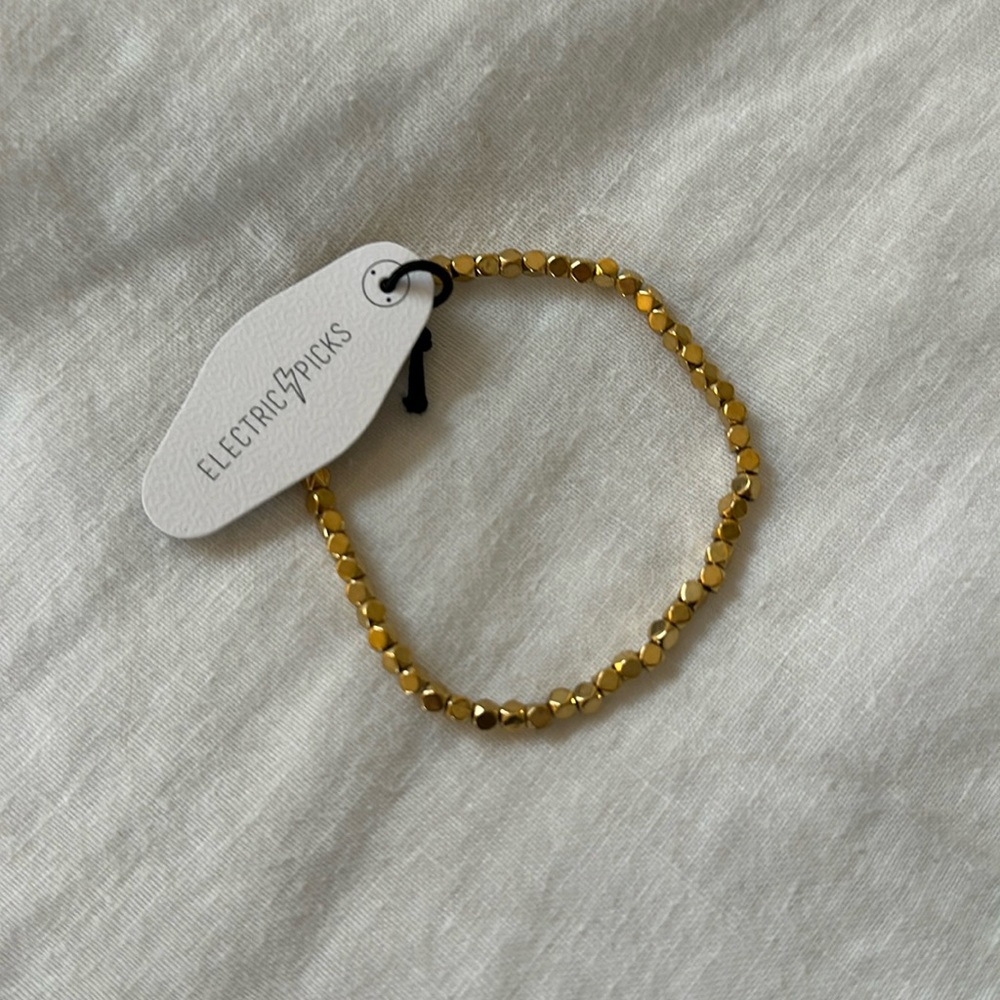 NEW Electric picks bracelet